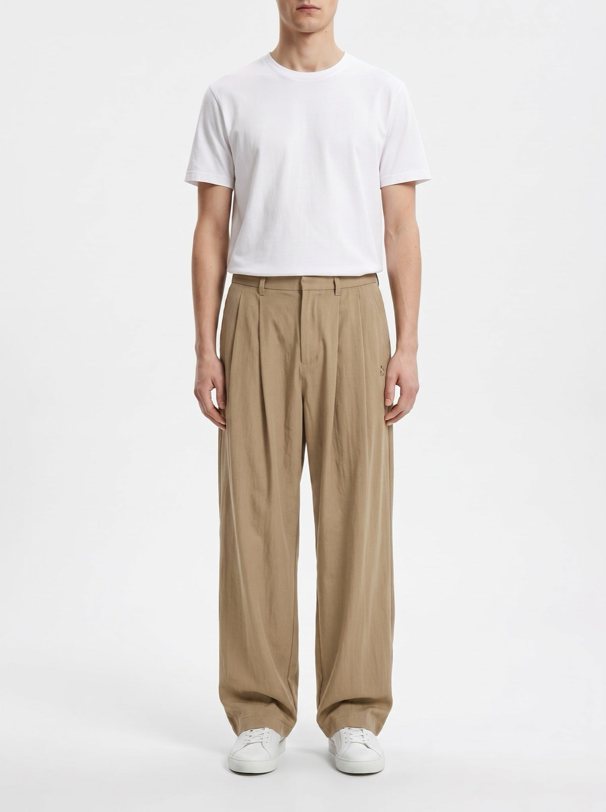 Avslappet brodert bukse med vide ben — Beige#farge_beige